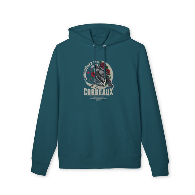 Sweat à capuche bleu pétrole avec une illustration de corbeau et des roses sur la poitrine.