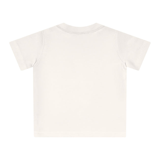 T-shirt pour bébé en coton biologique blanc avec des boutons-pression sur l'épaule.