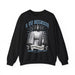 Sweatshirt noir pour homme avec une illustration religieuse et le texte Il est ressuscité.