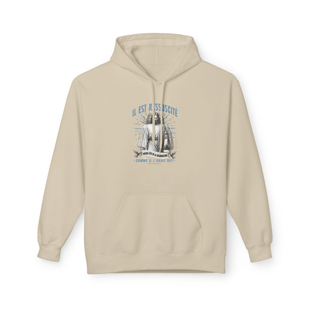 Sweat à capuche beige pour femme avec une illustration religieuse et le texte Il est ressuscité.