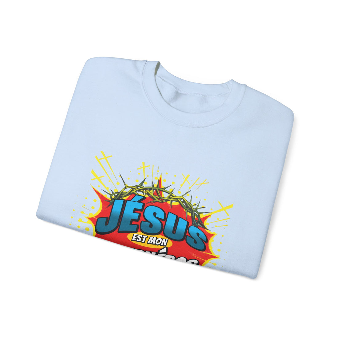 Sweat-shirt bleu clair plié avec une illustration style comics représentant une couronne d'épines.
