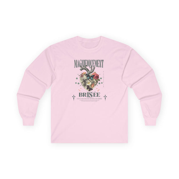T-shirt rose à manches longues avec un motif floral en forme de cœur et un message inspirant.
