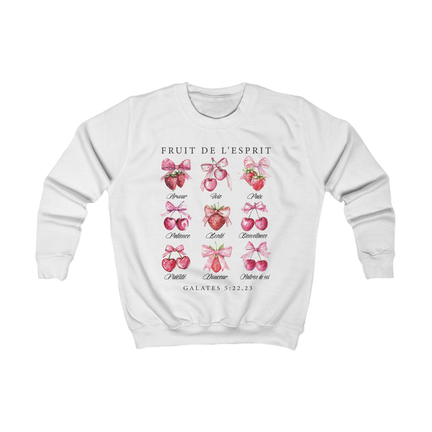 Sweat-shirt blanc pour enfant illustré de fruits et de nœuds roses avec le texte Fruit de l'esprit.