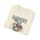 T-shirt beige plié avec une illustration de cœur floral, un papillon et le texte Magnifiquement.