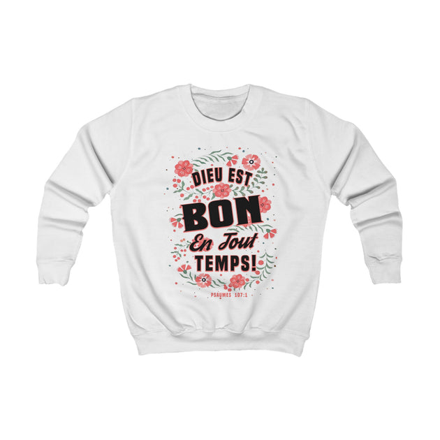 Sweatshirt blanc pour enfant orné d'un motif floral et du texte Dieu est bon en tout temps.