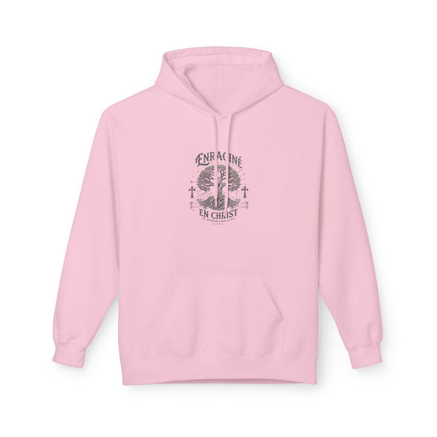 Sweat à capuche rose pâle avec un motif central représentant un arbre et des croix.
