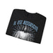 Sweatshirt noir plié avec l'inscription Il est ressuscité et une illustration de Jésus.