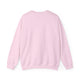 Sweat-shirt à col rond pour homme de couleur rose uni avec des finitions côtelées.