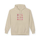 Sweat à capuche beige pour femme orné d'un motif illustré de fruits et de rubans roses.