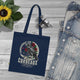 Tote bag bleu marine en coton biologique orné d'une illustration de corbeau et de roses.
