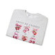 Sweat-shirt gris chiné orné d'illustrations de fraises et de cerises avec des nœuds roses.
