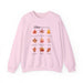 Sweat-shirt rose pâle orné de neuf feuilles d'automne et de textes bibliques en français.