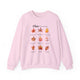 Sweat-shirt rose pâle orné de neuf feuilles d'automne et de textes bibliques en français.