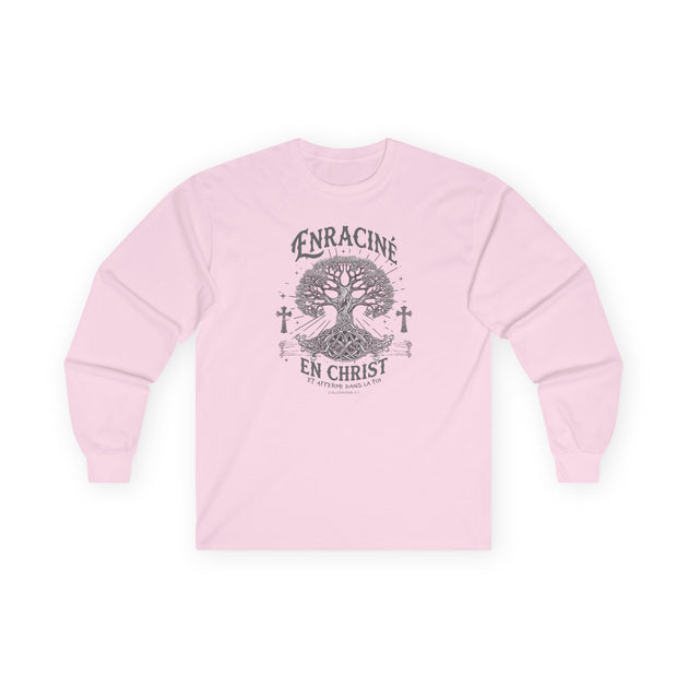 T-shirt rose à manches longues avec un motif d'arbre et l'inscription Enraciné en Christ.