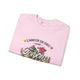 Sweatshirt rose pâle avec un motif floral et l'inscription L'Amour de Dieu dure Toujours.
