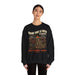 Une femme porte un sweat-shirt noir avec une illustration de paysage et un message religieux.