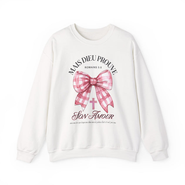 Sweatshirt blanc à col rond avec un motif de nœud vichy rose et une croix chrétienne.