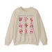 Sweat-shirt beige illustré de fruits et de nœuds roses avec le texte Fruit de l'Esprit.
