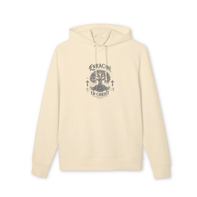 Sweat à capuche beige en coton biologique avec un motif d'arbre et de croix sur la poitrine.