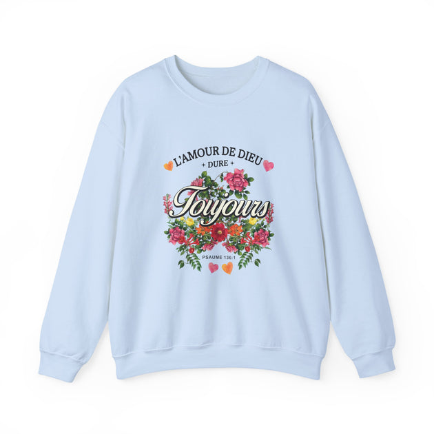 Sweatshirt bleu clair à col rond orné d'un motif floral et de l'inscription L'Amour de Dieu.