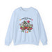 Sweatshirt bleu clair à col rond orné d'un motif floral et de l'inscription L'Amour de Dieu.