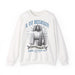 Sweat-shirt blanc à col rond avec une illustration religieuse et le texte Il est ressuscité.