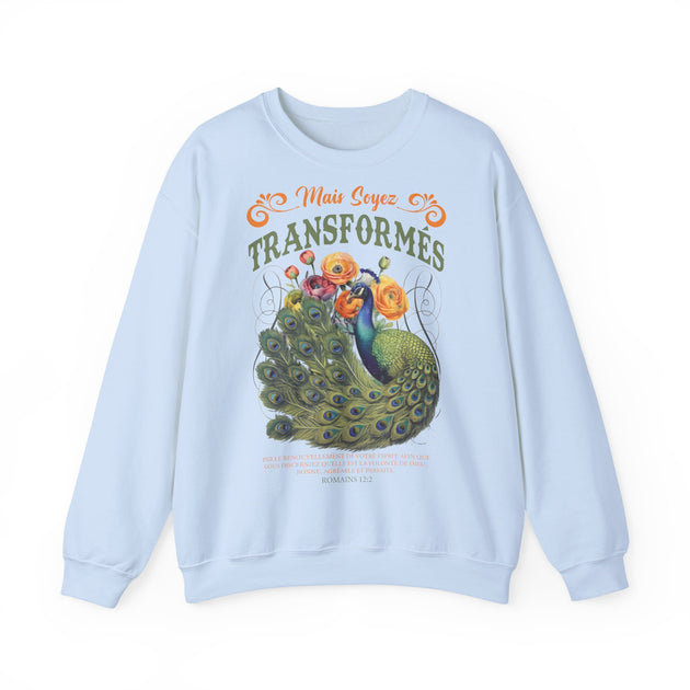 Sweat-shirt bleu clair avec un paon, des fleurs et le texte Mais soyez transformés.