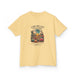 T-shirt jaune pour enfant avec une illustration de désert et un texte biblique en français.