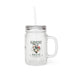 Bocal en verre dépoli avec couvercle métallique, paille et motif floral avec texte.