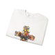 Sweat-shirt blanc plié orné d'une croix florale avec une colombe en son centre.