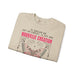 Sweat-shirt beige plié avec un papillon et le texte Si quelqu'un est en Christ, il est une création.