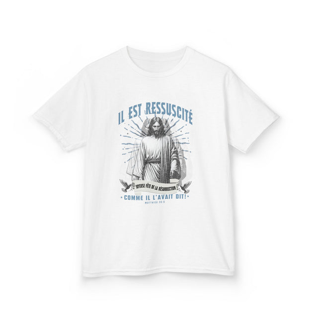 T-shirt blanc pour enfant avec une illustration de Jésus et le texte Il est ressuscité.