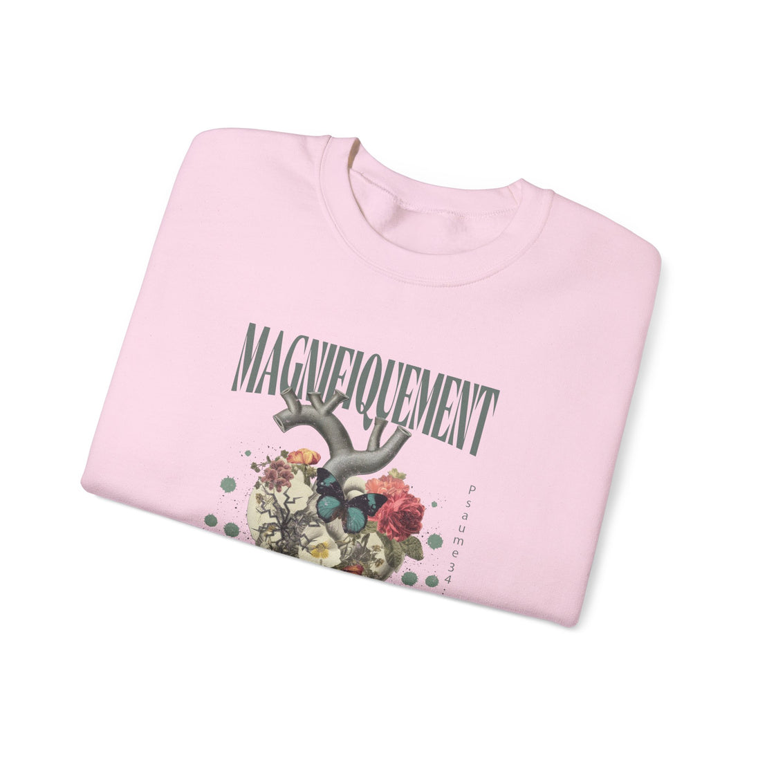 Sweat-shirt rose pâle avec un motif de cœur floral, un papillon et le texte Magnifiquement.