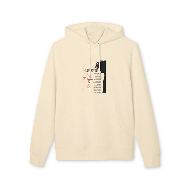 Sweat à capuche beige avec une illustration religieuse et du texte en français sur la poitrine.