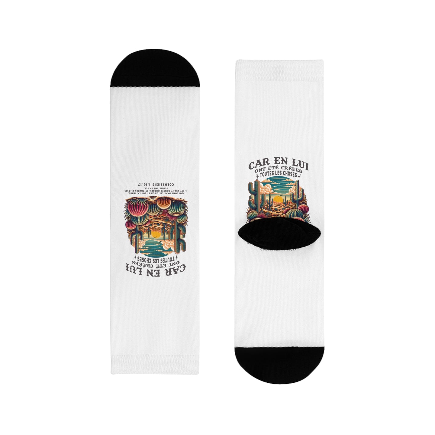 Paire de chaussettes blanches avec un motif de désert et le texte biblique en français.