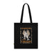 Tote bag noir en coton biologique orné d'une illustration religieuse et de texte en français.