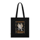 Tote bag noir en coton biologique orné d'une illustration religieuse et de texte en français.