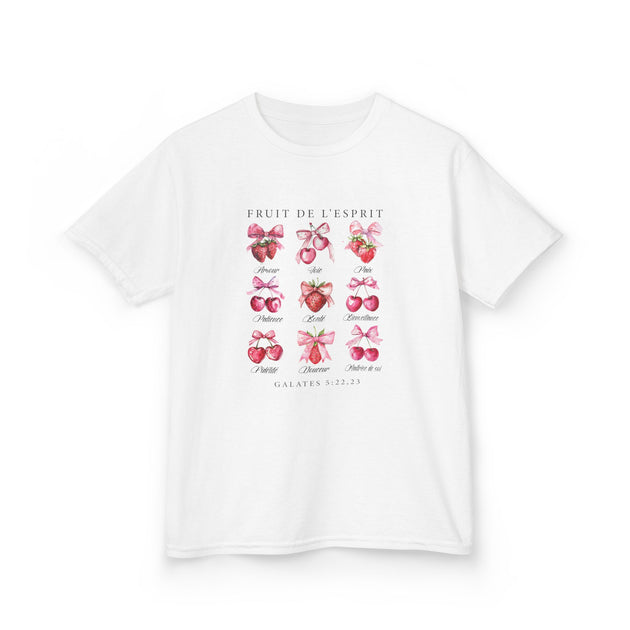 T-shirt blanc pour enfant illustré de fruits et de nœuds roses avec le texte Fruit de l'esprit.
