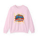 Sweat-shirt rose pâle avec une illustration style bande dessinée représentant une couronne d'épines.