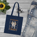 Tote bag bleu marine en coton biologique orné d'une illustration sur le thème des pains et poissons.