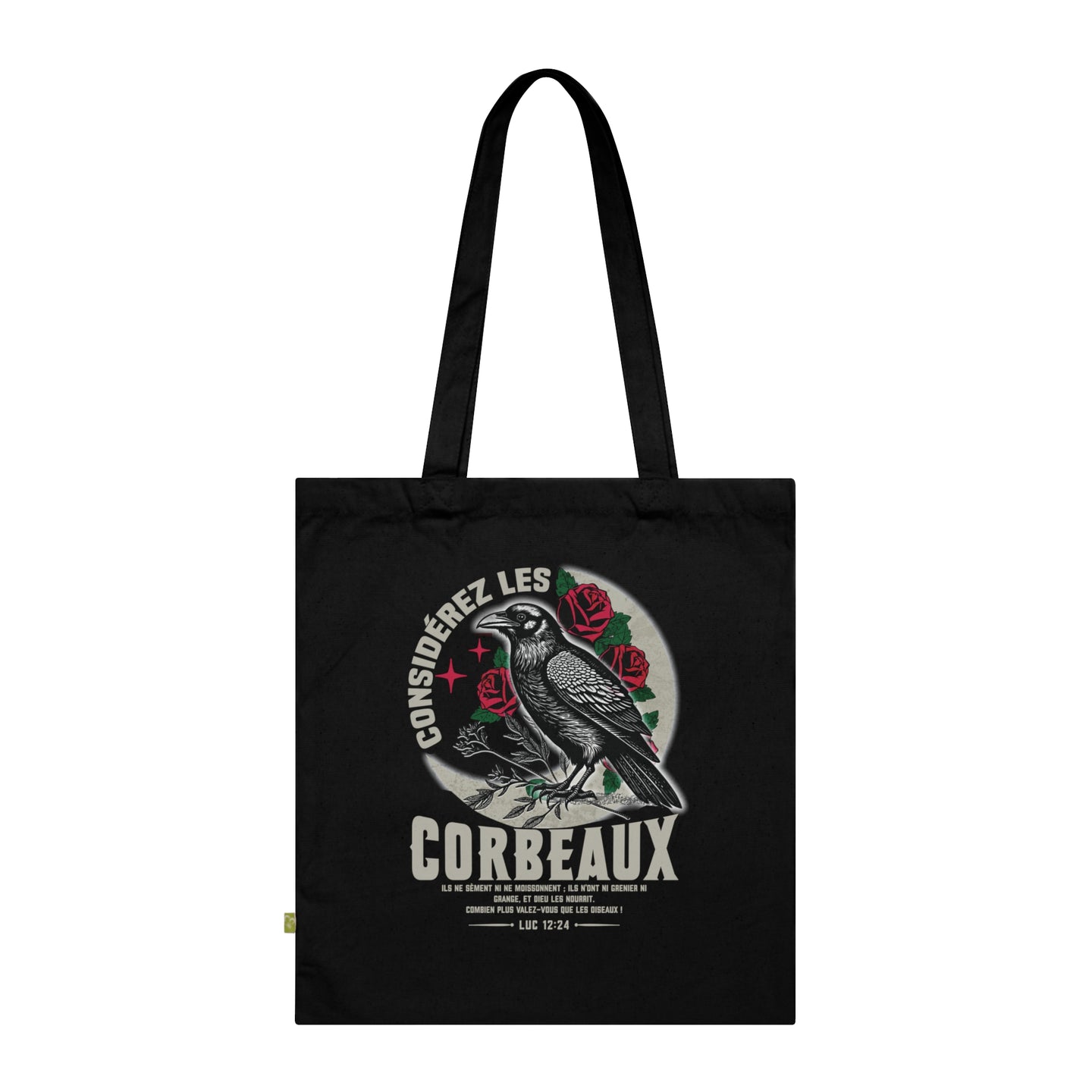 Tote bag noir en coton biologique illustré d'un corbeau entouré de roses avec un verset biblique.