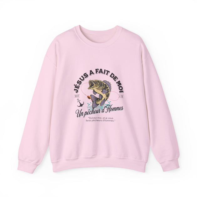 Sweat-shirt rose à col rond avec une illustration de poisson et un texte religieux en français.