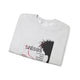 Sweat-shirt gris clair plié avec une illustration de Jésus portant une couronne d'épines.