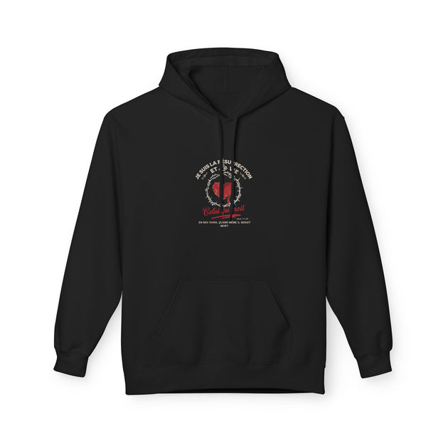 Sweat à capuche noir pour femme avec un motif religieux centré représentant un cœur et du texte.