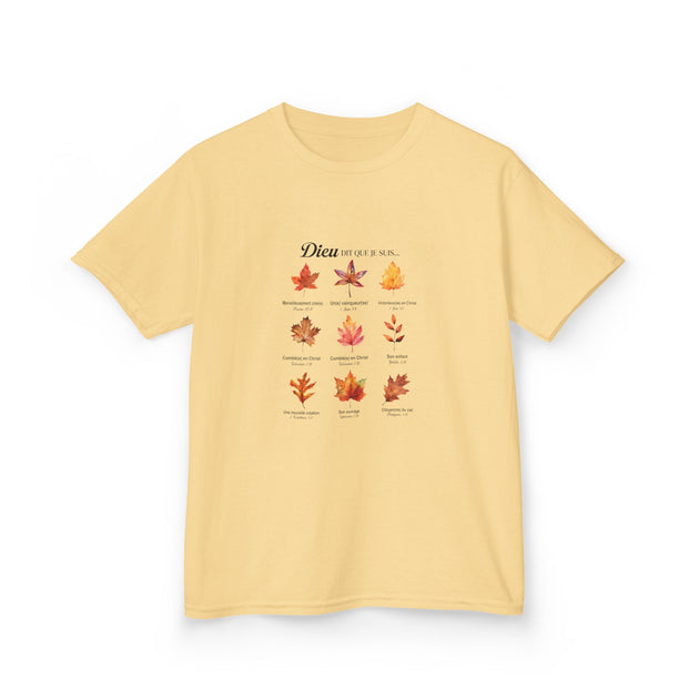 T-shirt jaune pâle pour enfant orné d'un motif de feuilles et de textes bibliques en français.