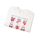 Sweat-shirt blanc pour femme orné d'illustrations de fruits et de nœuds roses avec des inscriptions.
