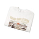 Sweat-shirt blanc plié avec une illustration de cowboy face au soleil et le texte en français.