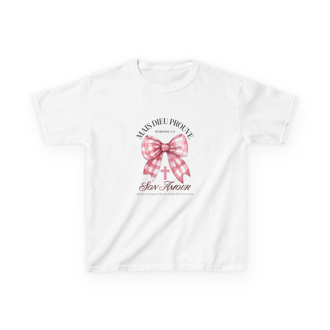 T-shirt blanc pour enfant orné d'un nœud rose à carreaux, d'une croix et du texte religieux.