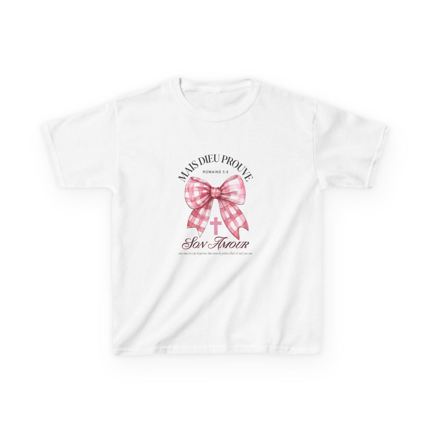 T-shirt blanc pour enfant orné d'un nœud rose à carreaux, d'une croix et du texte religieux.
