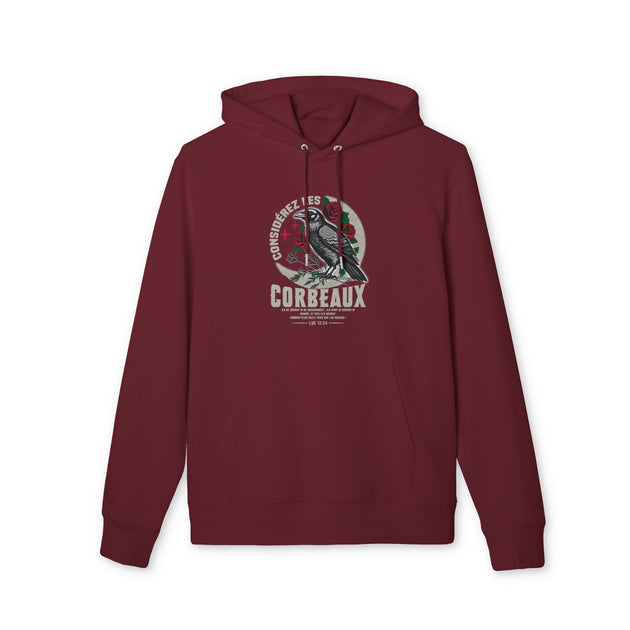 Sweat à capuche bordeaux avec une illustration de corbeau et un texte religieux sur la poitrine.
